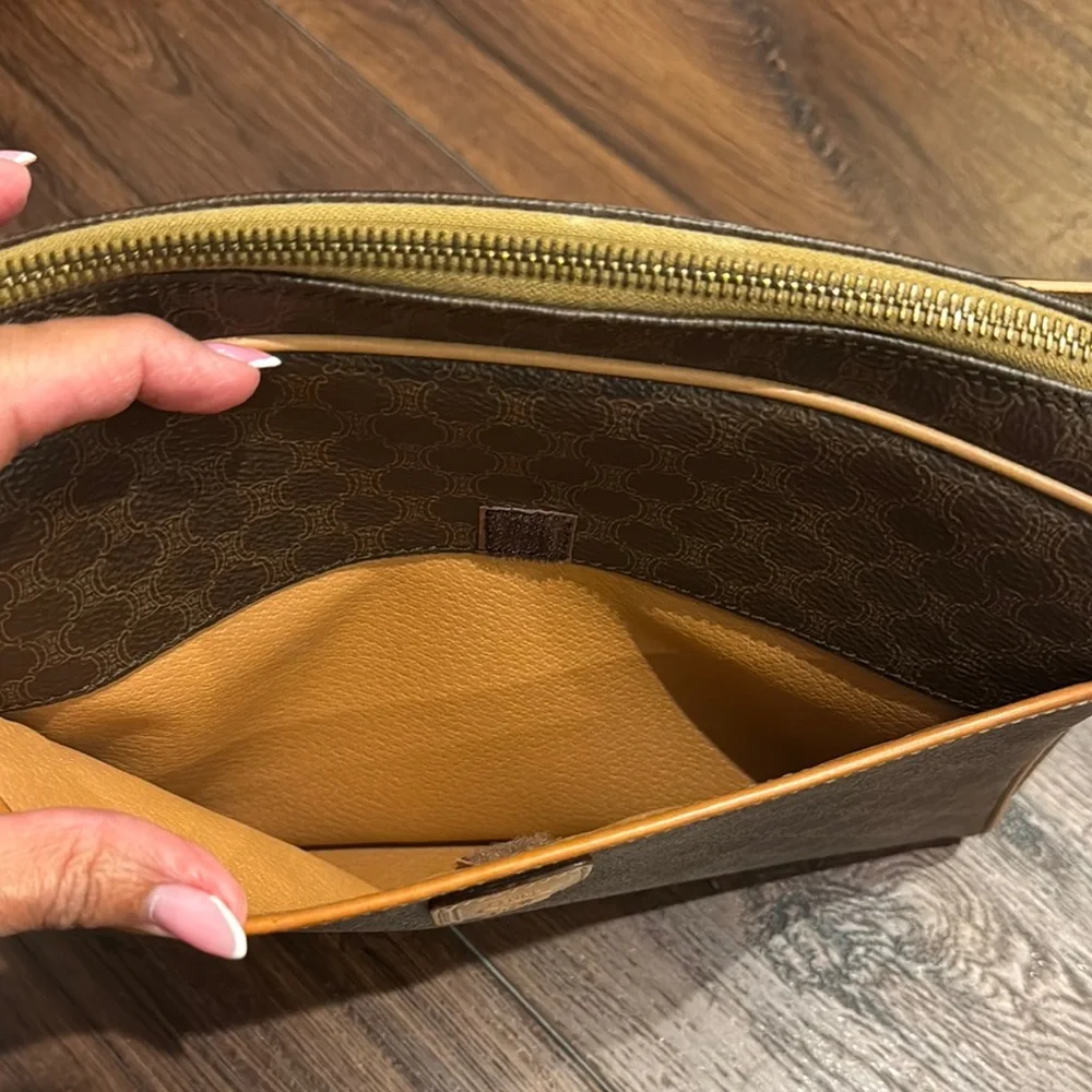 Celine Pre Owned Authentic Brown and Tan Toiletry Bag with Monogram Pattern.